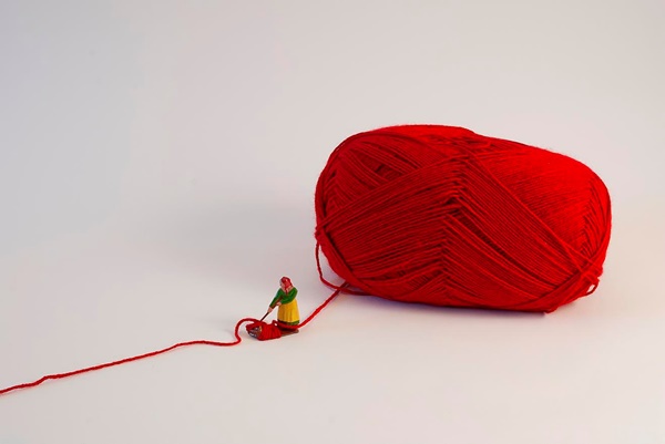 Liliana Porter, The Anarchist, 2024. Installation/Assemblage – Figure with red yarn, Variable
