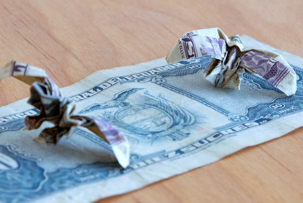 Paulo Nazareth, MC - Bestiary of Capital, 2019, origami made from the Artist's collection of international currencies, variable dimensions